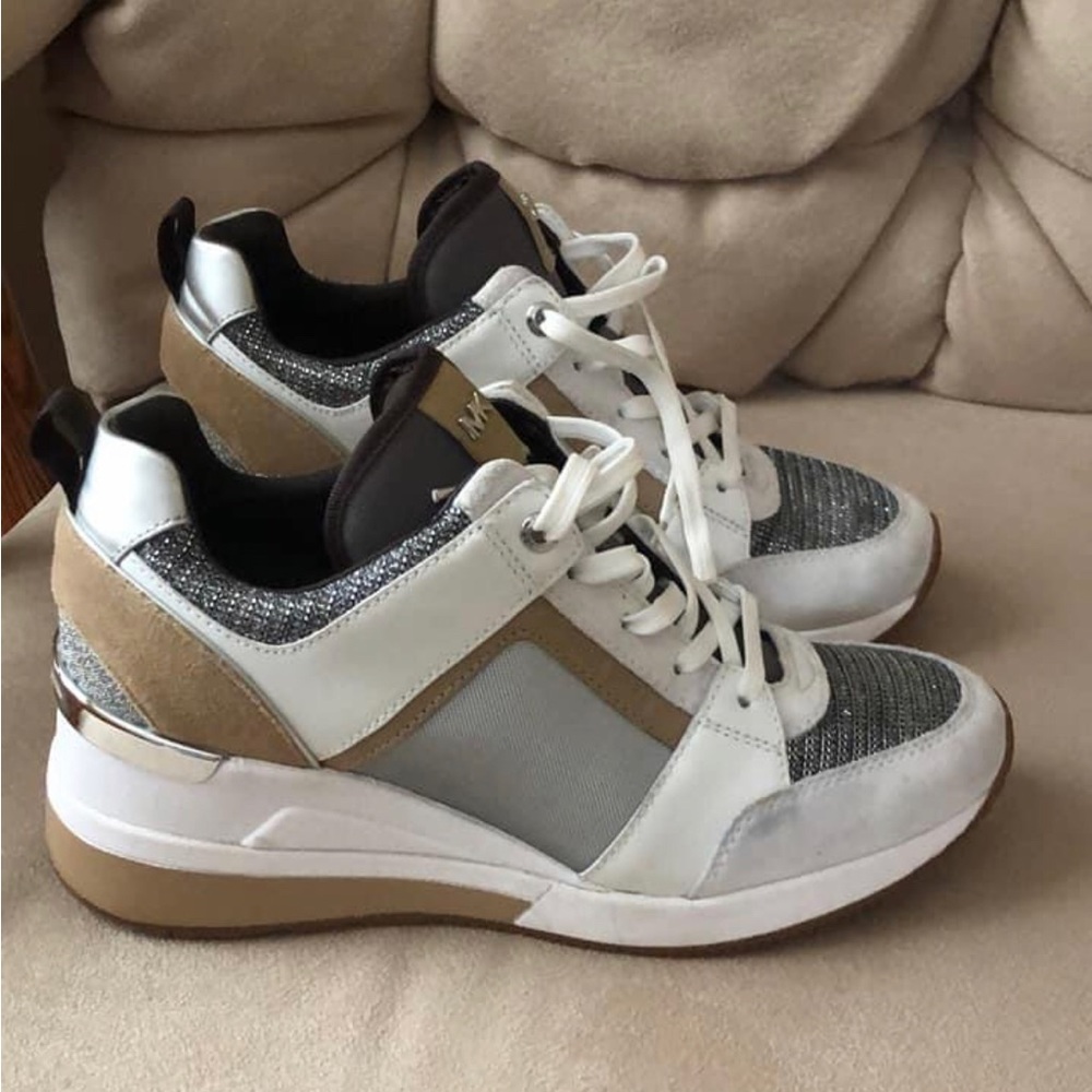 Brand New Michael Kors Tennis Shoes with wedge heal size 7.5